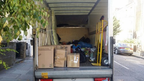 Construction site with waste materials awaiting clearance in Honor Oak