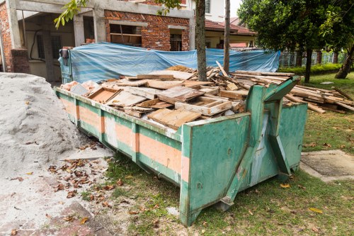 Construction site with a skip hire in Honor Oak